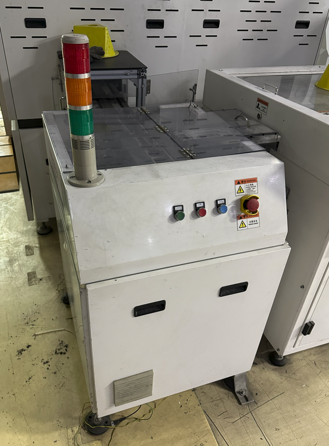 Industrial solar production station with control buttons and status tower